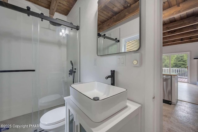 bathroom with beam ceiling, wooden ceiling, and toilet