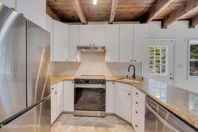 kitchen with white cabinetry, sink, stainless steel appliances, and light stone countertops