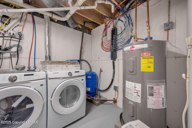 clothes washing area with water heater and washing machine and clothes dryer