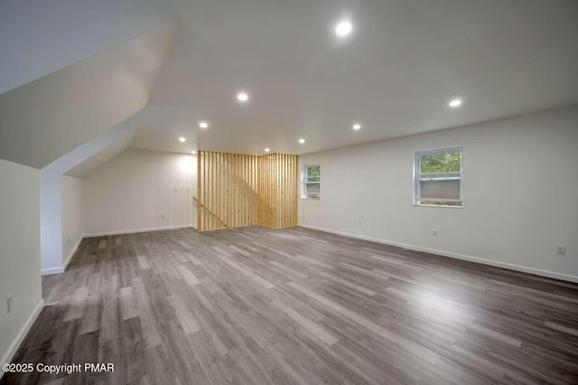 bonus room with hardwood / wood-style flooring