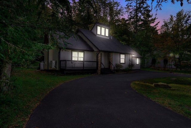 5266 Beechwood Rd, Blakeslee, PA 18610 - view of front of house featuring a lawn, a porch, and driveway