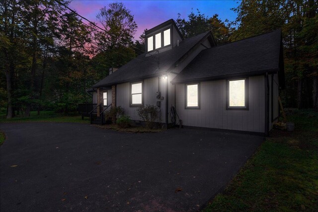 5266 Beechwood Rd, Blakeslee, PA 18610 - view of front of home featuring roof with shingles and driveway
