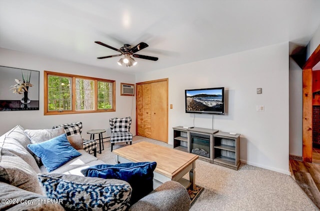 living room featuring ceiling fan, a wall mounted air conditioner, and light carpet