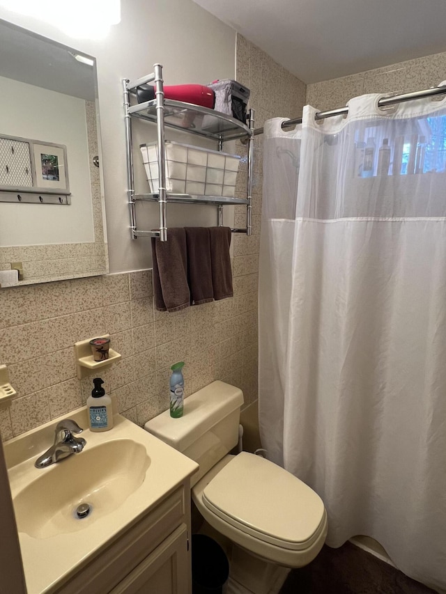 1755 Stag Run, Pocono Lake, PA 18347 - full bath featuring curtained shower, toilet, vanity, and tile walls