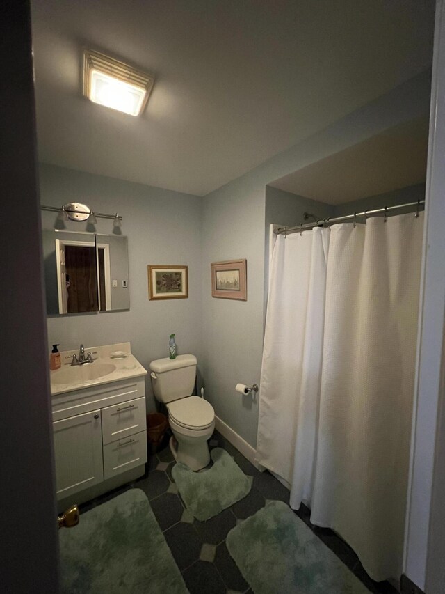 1755 Stag Run, Pocono Lake, PA 18347 - bathroom featuring baseboards, toilet, and vanity