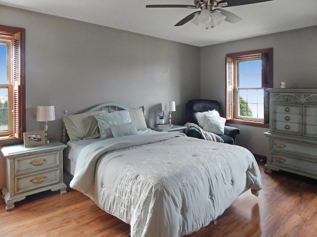 bedroom featuring ceiling fan and wood finished floors