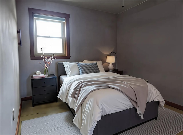 bedroom with baseboards