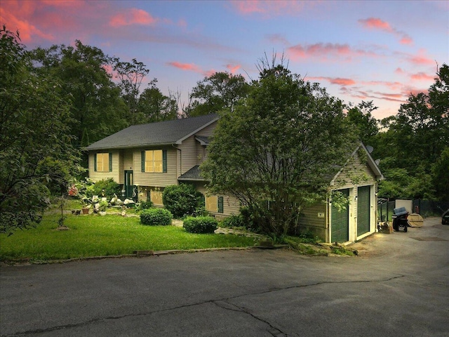 2602 Pocono Forested Dr, East Stroudsburg, PA 18302 - raised ranch with asphalt driveway and a front lawn