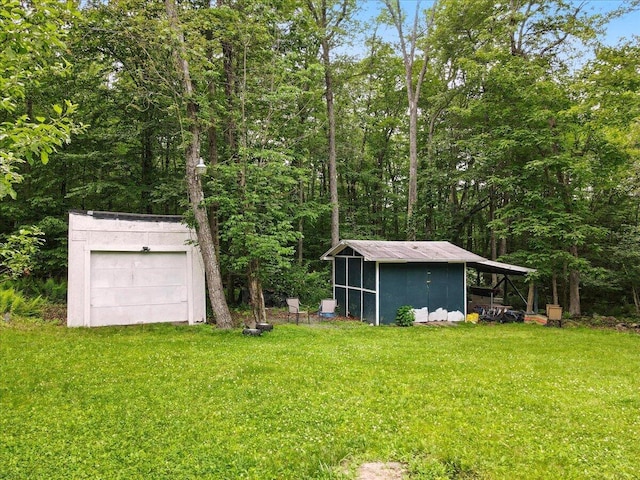 2602 Pocono Forested Dr, East Stroudsburg, PA 18302 - view of green lawn with an outdoor structure