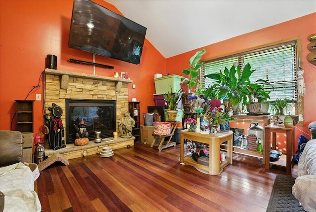 2602 Pocono Forested Dr, East Stroudsburg, PA 18302 - living room with wood finished floors, a stone fireplace, and high vaulted ceiling