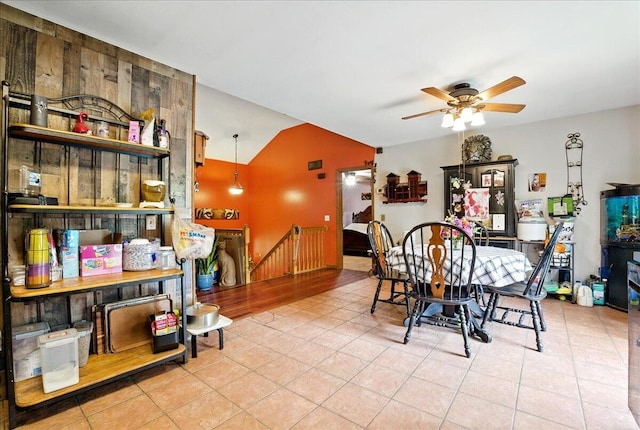 2602 Pocono Forested Dr, East Stroudsburg, PA 18302 - tiled dining area with a ceiling fan, vaulted ceiling, and stairs