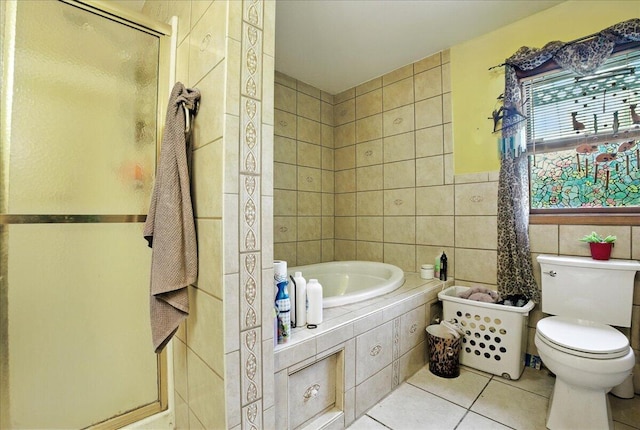 2602 Pocono Forested Dr, East Stroudsburg, PA 18302 - bathroom with tile walls, tile patterned floors, a shower stall, and a bath