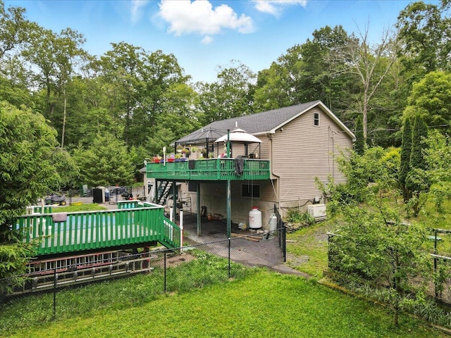 2602 Pocono Forested Dr, East Stroudsburg, PA 18302 - back of property with a deck and stairway