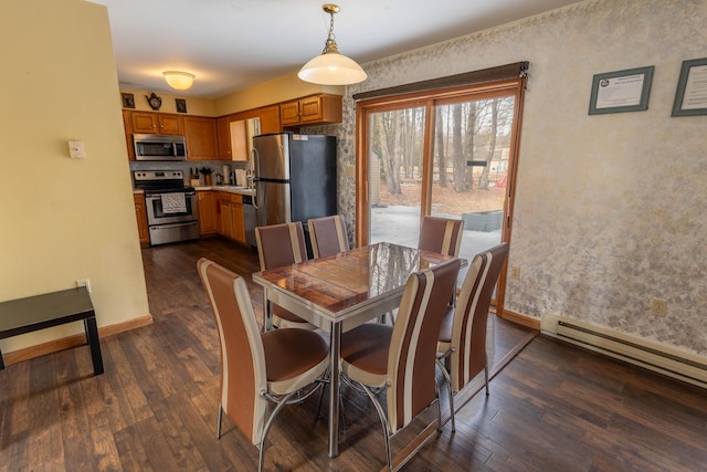 dining area featuring dark wood-type flooring, a baseboard radiator, and baseboards