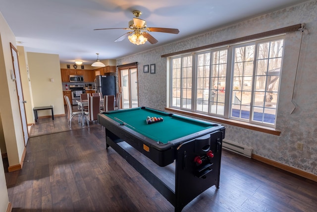 rec room with wallpapered walls, a baseboard radiator, baseboards, and dark wood finished floors