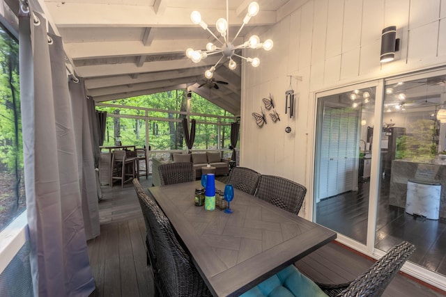 sunroom featuring outdoor lounge area, outdoor dining space, a chandelier, and a ceiling fan