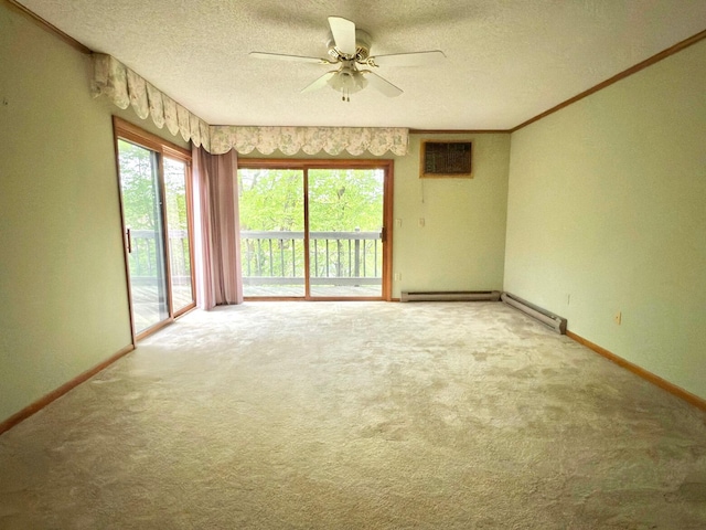 402 Shinymountain Ct, Greentown, PA 18426 - unfurnished room with a ceiling fan, carpet flooring, a textured ceiling, a wall mounted AC, and a baseboard radiator