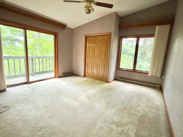 402 Shinymountain Ct, Greentown, PA 18426 - carpeted empty room with lofted ceiling, a baseboard radiator, and a ceiling fan