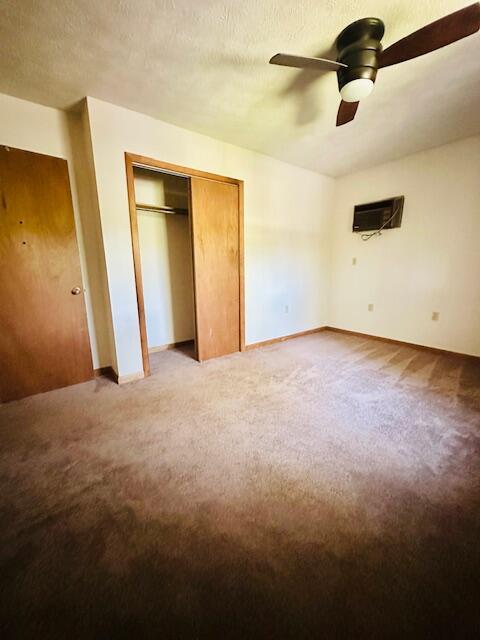 2383 Eagle Path, Bushkill, PA 18324 - unfurnished bedroom featuring carpet floors, a closet, and ceiling fan