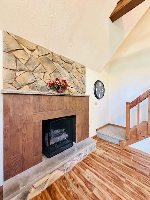 2383 Eagle Path, Bushkill, PA 18324 - detailed view of a fireplace with raised hearth and wood finished floors