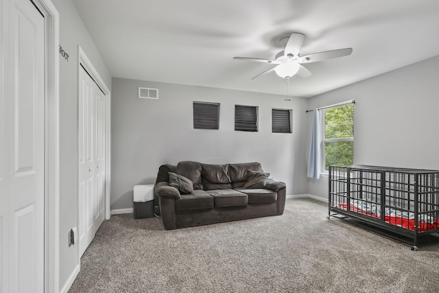 1127 Fillmore St, East Stroudsburg, PA 18301 - carpeted living room featuring a ceiling fan and baseboards