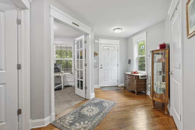 1127 Fillmore St, East Stroudsburg, PA 18301 - foyer entrance with healthy amount of natural light, french doors, and wood finished floors