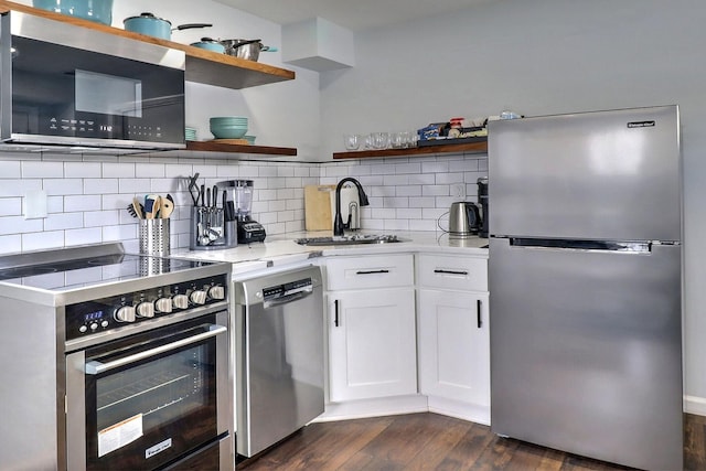 3360 Rte 940, Mount Pocono, PA 18344 - kitchen featuring a sink, open shelves, dark wood-style floors, and appliances with stainless steel finishes
