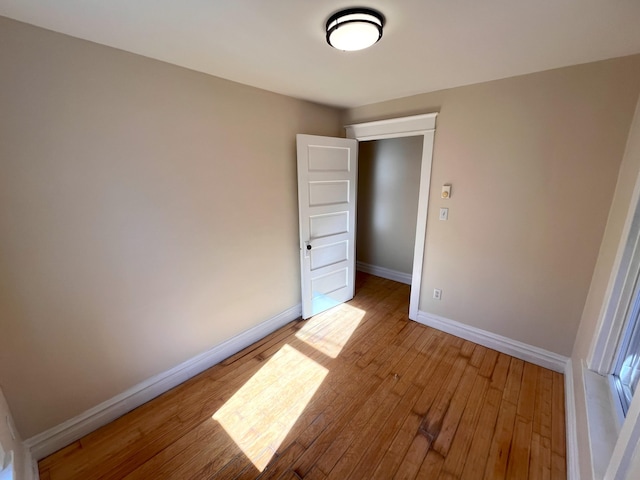 interior space with light wood-style flooring and baseboards