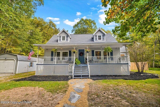 172 Steep Hill Rd, Cresco, PA 18326 - view of front of home with a porch, an outdoor structure, a garage, and a shingled roof