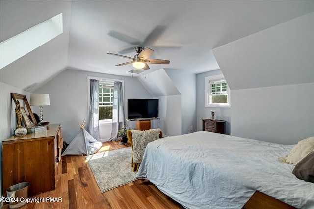 172 Steep Hill Rd, Cresco, PA 18326 - bedroom with lofted ceiling, wood finished floors, multiple windows, and ceiling fan
