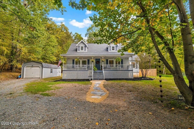 172 Steep Hill Rd, Cresco, PA 18326 - new england style home featuring covered porch, an outbuilding, a garage, and driveway