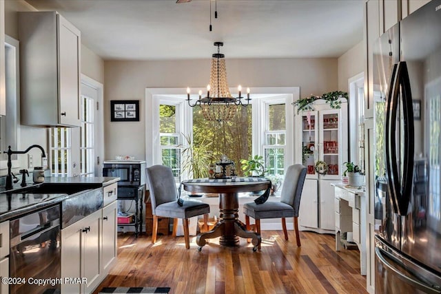 172 Steep Hill Rd, Cresco, PA 18326 - dining room featuring a chandelier and wood finished floors