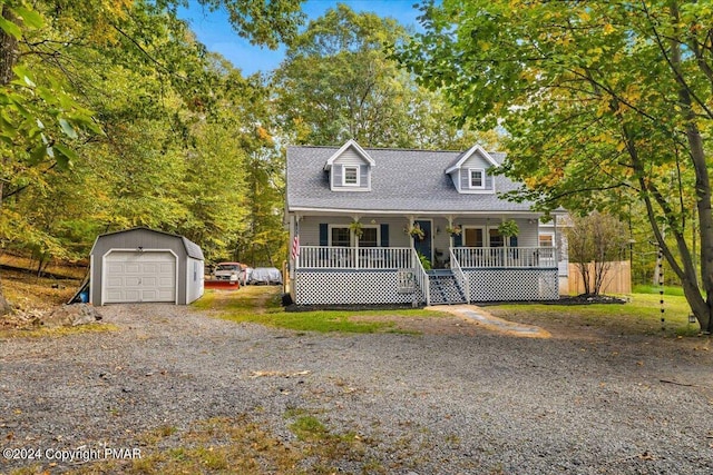 172 Steep Hill Rd, Cresco, PA 18326 - cape cod-style house with a porch, an outdoor structure, a garage, and roof with shingles
