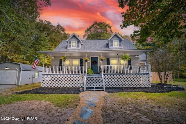 172 Steep Hill Rd, Cresco, PA 18326 - view of front facade with a porch, an outbuilding, and a detached garage