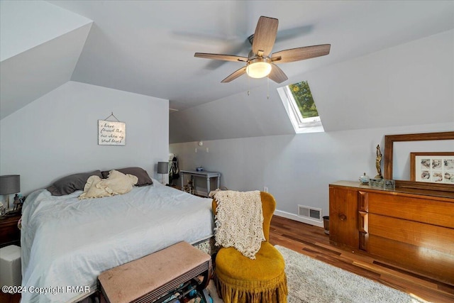 172 Steep Hill Rd, Cresco, PA 18326 - bedroom featuring lofted ceiling, wood finished floors, a skylight, and ceiling fan