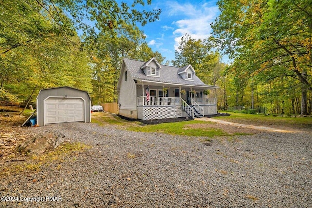 172 Steep Hill Rd, Cresco, PA 18326 - view of front of home featuring covered porch, an outbuilding, a garage, and driveway