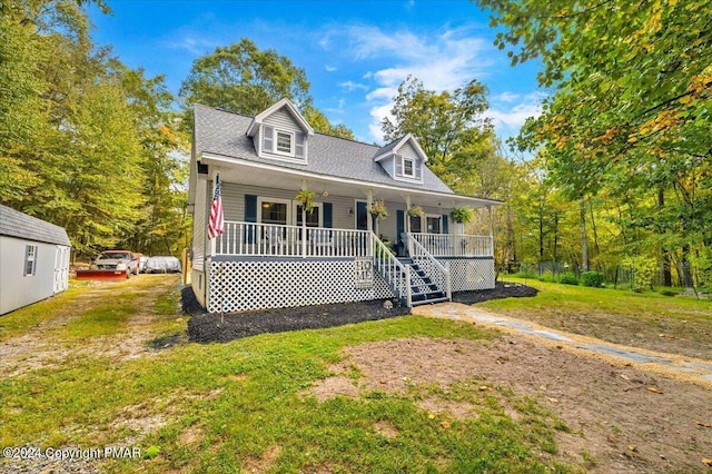 172 Steep Hill Rd, Cresco, PA 18326 - cape cod house featuring a porch and stairway
