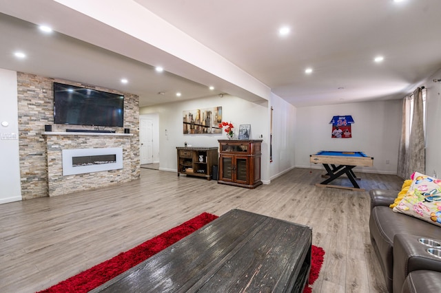 1555 Longleaf Dr, Effort, PA 18330 - living room with wood finished floors, a fireplace, and recessed lighting
