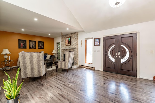 1555 Longleaf Dr, Effort, PA 18330 - entrance foyer featuring lofted ceiling, wood finished floors, recessed lighting, and a stone fireplace