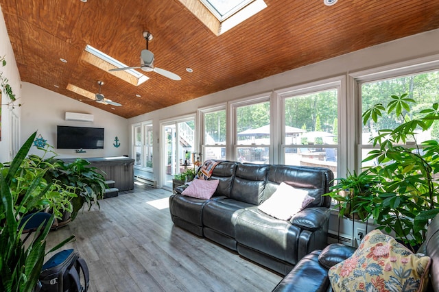 1555 Longleaf Dr, Effort, PA 18330 - sunroom featuring a skylight, a hot tub, vaulted ceiling, and an AC wall unit
