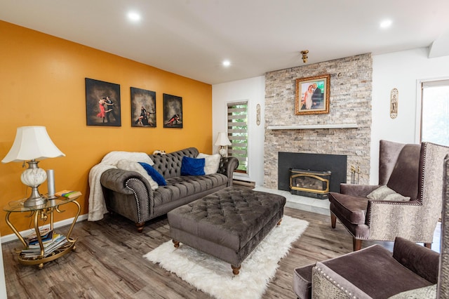 1555 Longleaf Dr, Effort, PA 18330 - living area with wood finished floors, healthy amount of natural light, recessed lighting, and a fireplace