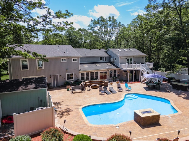 1555 Longleaf Dr, Effort, PA 18330 - view of pool with a fire pit, a jacuzzi, a patio, and stairway