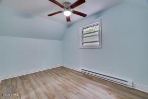 3109 Snowden Dr, Bushkill, PA 18324 - bonus room with a baseboard heating unit, wood finished floors, lofted ceiling, and a ceiling fan
