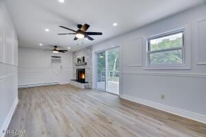 3109 Snowden Dr, Bushkill, PA 18324 - unfurnished living room with wood finished floors, recessed lighting, a large fireplace, and ceiling fan