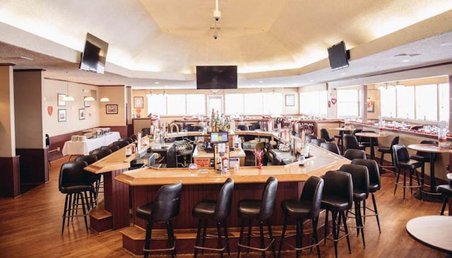 3109 Snowden Dr, Bushkill, PA 18324 - community bar area with a tray ceiling and wood finished floors