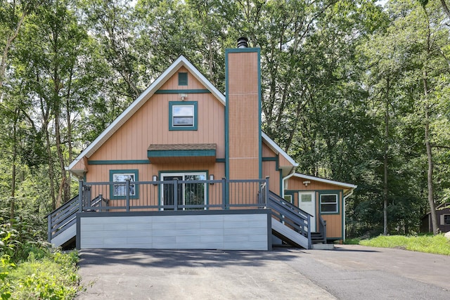 3109 Snowden Dr, Bushkill, PA 18324 - rustic home featuring a chimney