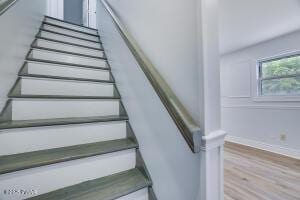 3109 Snowden Dr, Bushkill, PA 18324 - stairs with wood finished floors and baseboards