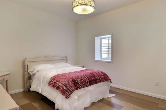 301 Reagan Dr, East Stroudsburg, PA 18301 - bedroom with baseboards and wood finished floors
