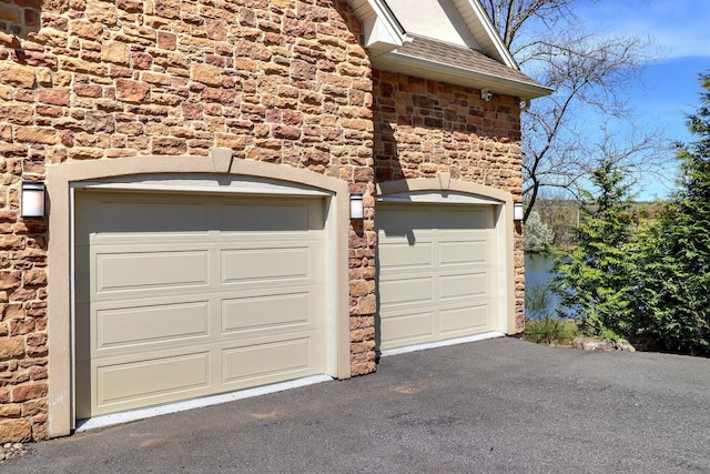 301 Reagan Dr, East Stroudsburg, PA 18301 - garage featuring driveway