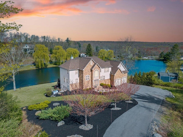 301 Reagan Dr, East Stroudsburg, PA 18301 - aerial view at dusk featuring a water view